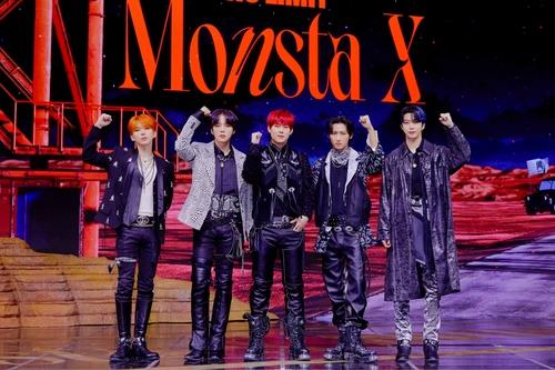 This photo provided by Starship Entertainment shows boy band Monsta X posing for photos during a media showcase for the group's new mini album "No Limit" streamed online on Nov. 19, 2021. (PHOTO NOT FOR SALE) (Yonhap)