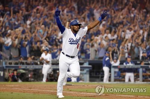 In this Getty Images file photo from Oct. 27, 2018, Yasiel Puig of the Los Angeles Dodgers celebrates his three-run home run against the Boston Red Sox in the bottom of the sixth inning of Game 4 of the World Series at Dodger Stadium in Los Angeles. (Yonhap)