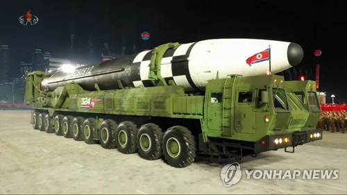 This image captured from Korean Central Television footage on Oct. 10, 2020, shows North Korea's new intercontinental ballistic missile, which was displayed during a military parade held in Pyongyang on the same day to mark the 75th founding anniversary of the ruling Workers' Party. (For Use Only in the Republic of Korea. No Redistribution) (Yonhap)
