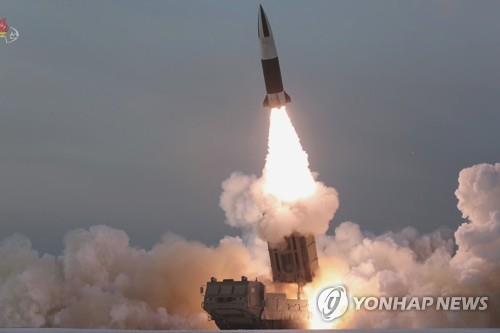 This photo, captured from North Korea's Central TV on Jan. 18, 2022, shows one of two tactical guided missiles that the North test-fired from a transporter erector launcher toward an island target in the East Sea the previous day. The missile appears to be the North Korean version of the U.S.' Army Tactical Missile System (ATACMS), called the KN-24. (For Use Only in the Republic of Korea. No Redistribution) (Yonhap)