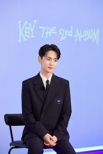 K-pop boy group SHINee's dancer-vocalist Key poses for the camera during an online press conference in Seoul on Aug. 30, 2022, in this photo provided by SM Entertainment. (PHOTO NOT FOR SALE) (Yonhap)