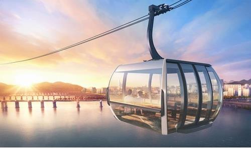 This rendering provided by the Seoul city government on March 9, 2023, shows a gondola cable car system planned over the Han River. (PHOTO NOT FOR SALE) (Yonhap)
