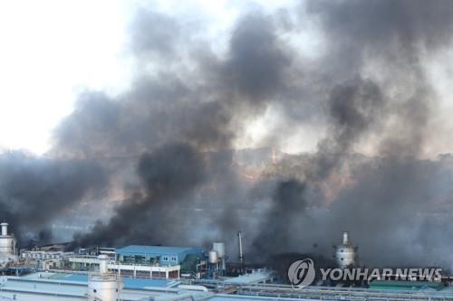 Flames and smoke spew from a Hankook Tire Co. plant in the central city of Daejeon on March 13, 2023, after it was engulfed by a fire at 10:09 p.m. the previous day. (Yonhap)