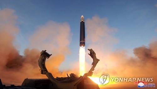 This photo, carried by North Korea's official Korean Central News Agency (KCNA) on March 17, 2023, shows the North firing a Hwasong-17 intercontinental ballistic missile from the Sunan area in Pyongyang the previous day. (For Use Only in the Republic of Korea. No Redistribution) (Yonhap)