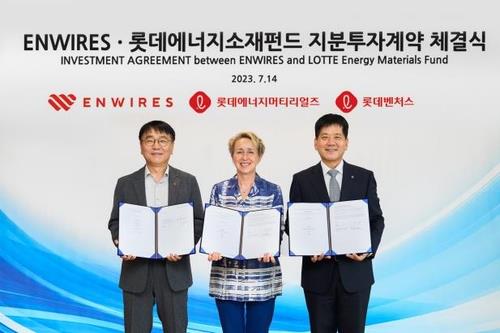 Officials from Lotte Energy Materials Corp., Lotte Ventures and Enwires pose for a photo after signing an equity investment agreement in Seoul on July 14, 2023, in this photo provided by Lotte Energy Materials. (PHOTO NOT FOR SALE) (Yonhap)