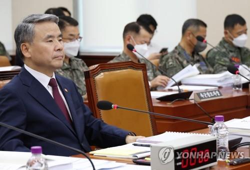 This file photo, taken Aug. 21, 2023, shows Defense Minister Lee Jong-sup (L) attending a session of the National Defense Committee at the National Assembly in western Seoul. (Yonhap)
