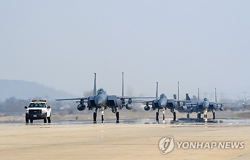 South Korean F-15Ks taxi on a runway at Osan Air Base in Pyeongtaek, 60 kilometers south of Seoul, in this file photo provided by the Air Force on March 4, 2024. (PHOTO NOT FOR SALE) (Yonhap)