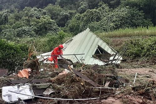 This image, provided by fire authorities, shows a shipping container being used as a farmer's hut damaged by heavy rain in Yeongdong, North Chungcheong Province, on July 10, 2024. (PHOTO NOT FOR SALE) (Yonhap)