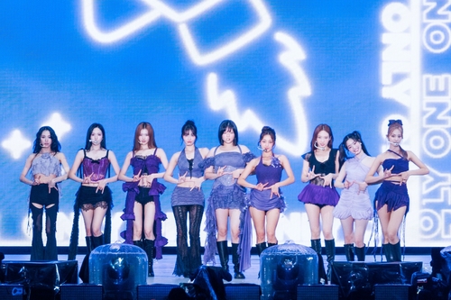 K-pop girl group TWICE is seen in this photo provided by JYP Entertainment. (PHOTO NOT FOR SALE) (Yonhap)