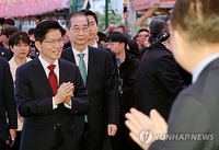 (LEAD) Ex-PM Han proposes meeting with PPP presidential candidate Kim Monday