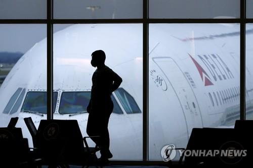'노 마스크 난동' 항공기 승객들에 100만달러 과태료 처분