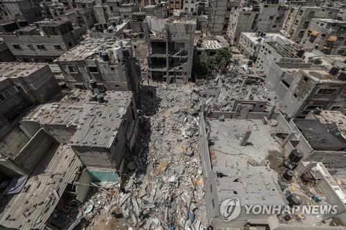 이스라엘의 공습으로 폐허가 된 가자지구.[EPA 연합뉴스 자료사진. 재판매 및 DB 금지] 