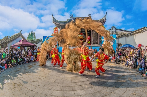 In front of the unique ancient buildings of Pudong's Sanlin Town,