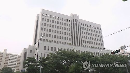 미래에셋PE 전 대표 '사기적 부정거래' 혐의 검찰 소환