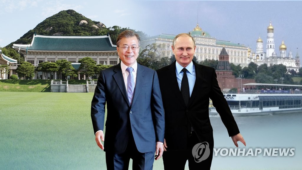 This file image provided by Yonhap News TV shows South Korean President Moon Jae-in (L) and Russian President Vladimir Putin (R). (PHOTO NOT FOR SALE) (Yonhap)