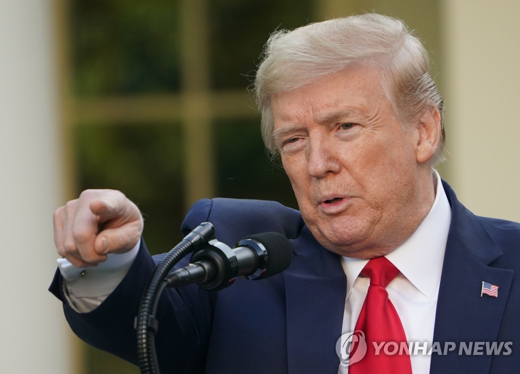 This AFP photo shows U.S. President Donald Trump taking questions from reporters during a news conference in the Rose Garden of the White House in Washington on April 27, 2020. (Yonhap)