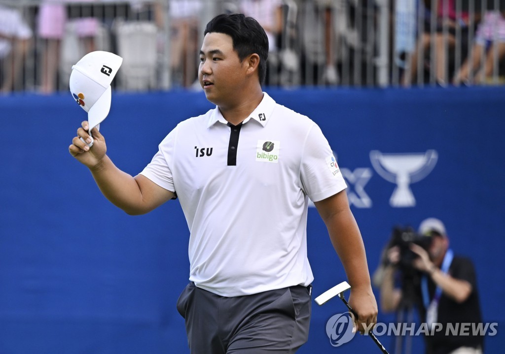 In this Getty Images photo, Kim Joo-hyung of South Korea celebrates after making a par putt on the 18th green to win the Wyndham Championship at Sedgefield Country Club in Greensboro, North Carolina, on Aug. 7, 2022. (Yonhap)