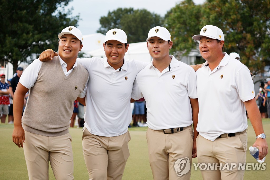 In this Getty Images photo, four South Korean golfers pose for a photo during the Presidents Cup against the United States at Quail Hollow Club in Charlotte, North Carolina, on Sept. 24, 2022. From left: Lee Kyoung-hoon, Kim Joo-hyung, Kim Si-woo and Im Sung-jae. (Yonhap)