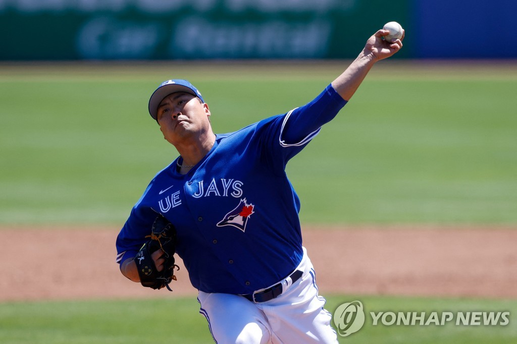 In this USA Today Sports photo via Reuters, Ryu Hyun-jin of the Toronto Blue Jays pitches against the Detroit Tigers during the top of the second inning of a Major League Baseball spring training game at TD Ballpark in Dunedin, Florida, on March 25, 2022. (Yonhap)