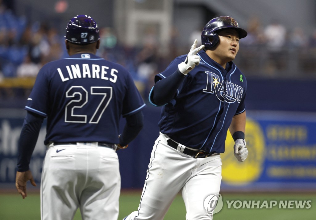 In this USA Today Sports photo via Reuters, Choi Ji-man of the Tampa Bay Rays (R) rounds the bases after hitting a two-run home run against the Miami Marlins during the bottom of the sixth inning of a Major League Baseball regular season game at Tropicana Field in St. Petersburg, Florida, on May 24, 2022. (Yonhap)