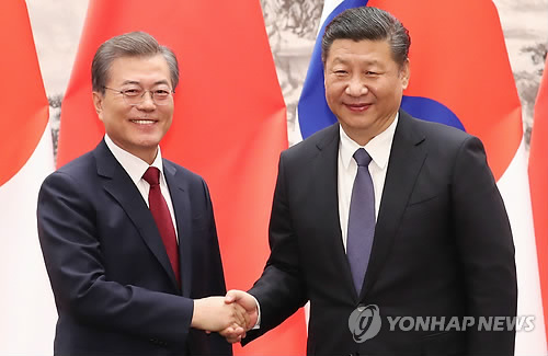 Moon, Xi hold summit over N.K. denuclearization