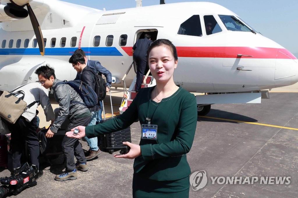韓国記者団　北朝鮮に到着
