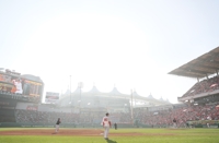 Baseball league to distribute dust masks to protect fans