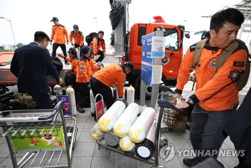 Secouristes à l'aéroport d'Incheon