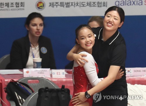 (LEAD) Teen gymnast set to be immortalized in int'l scoring book