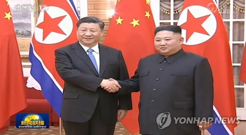 (LEAD) Kim et Xi conviennent de renforcer les liens bilatéraux pour favoriser la paix et la stabilité régionales