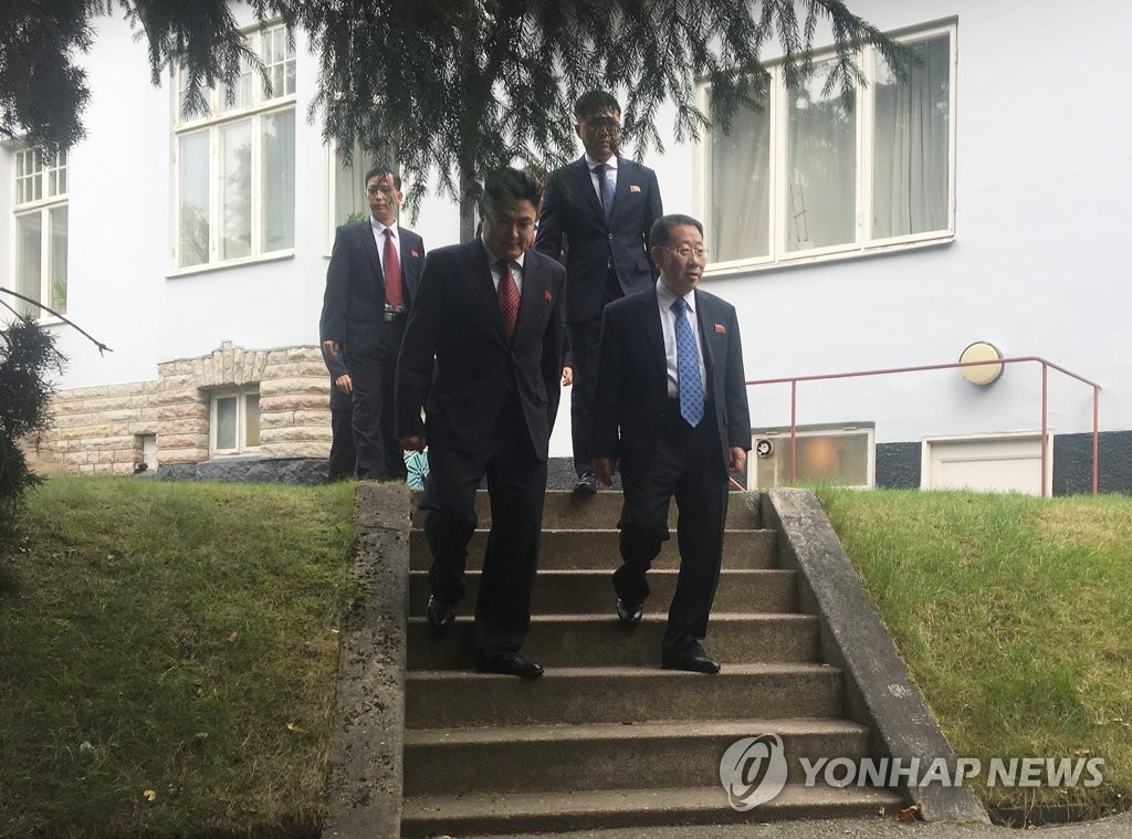North Korean delegates, including top negotiator Kim Myong-gil, leave the country's embassy in Stockholm on Oct. 6, 2019, after holding working-level talks with U.S. officials. After the meeting, Kim said the talks broke down as the United States failed to come up with a new proposal. (Yonhap)
