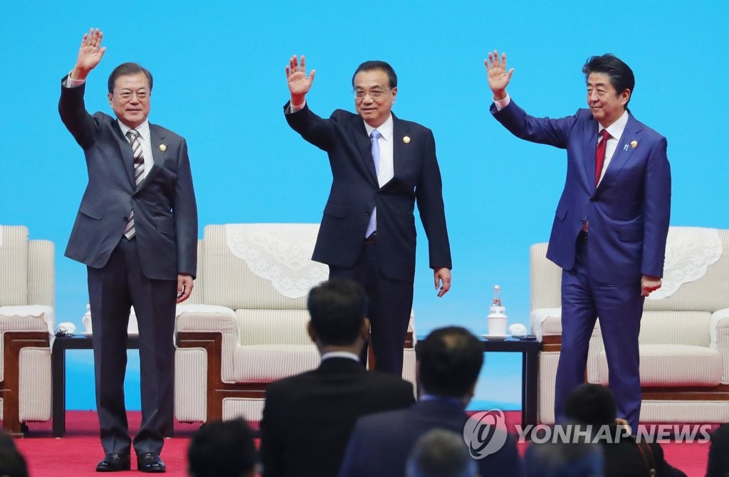 文大統領「自由貿易を守るべき」　韓中日ビジネス会合で演説