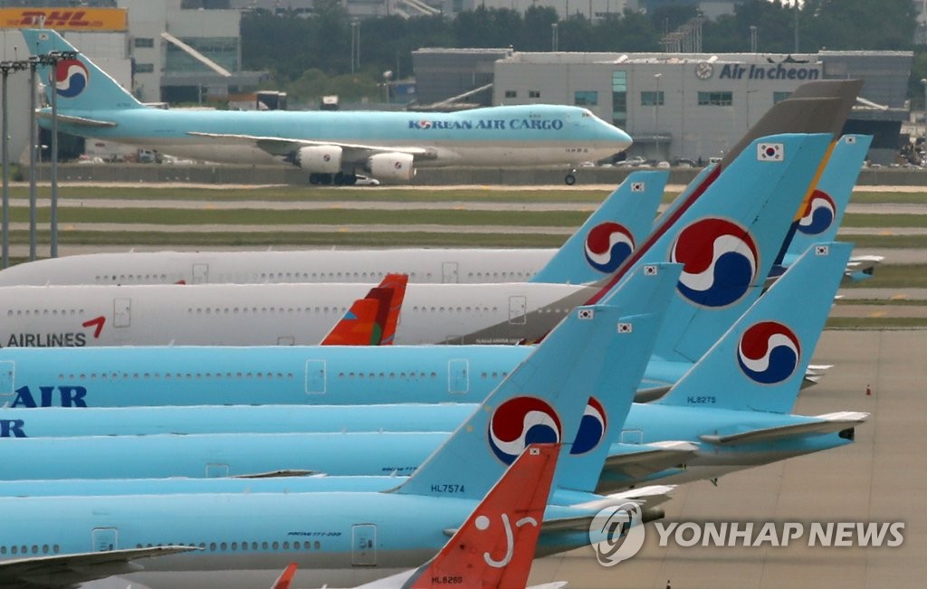 This photo taken on July 7, 2020, shows aircraft of Korean Air Lines Co. parked at Incheon International Airport in Incheon. (Yonhap)