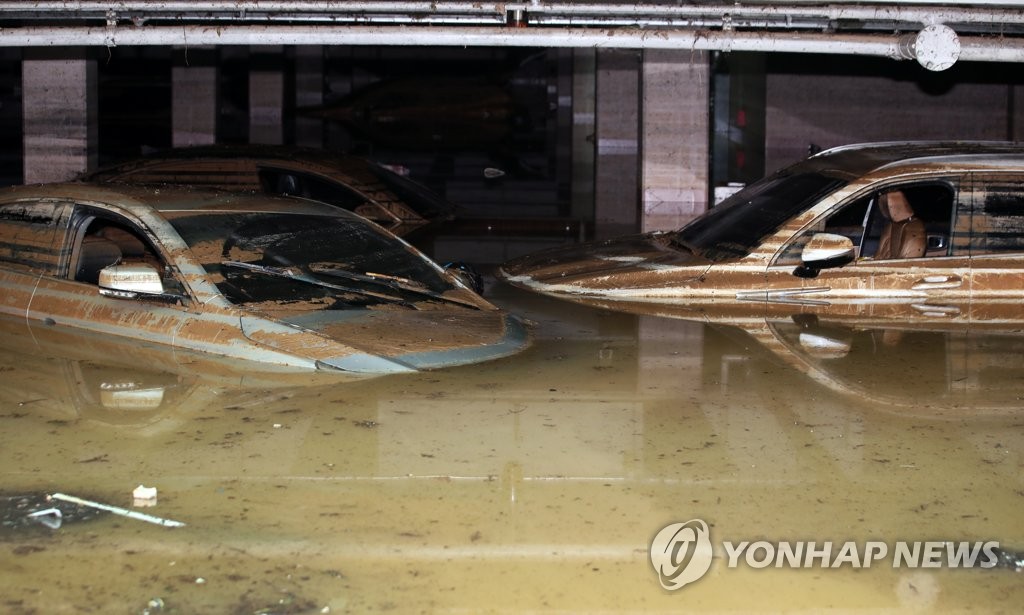 An underground parking lot of an apartment complex in Gwangju, 329 kilometers south of Seoul, is flooded on Aug. 9, 2020. (Yonhap)