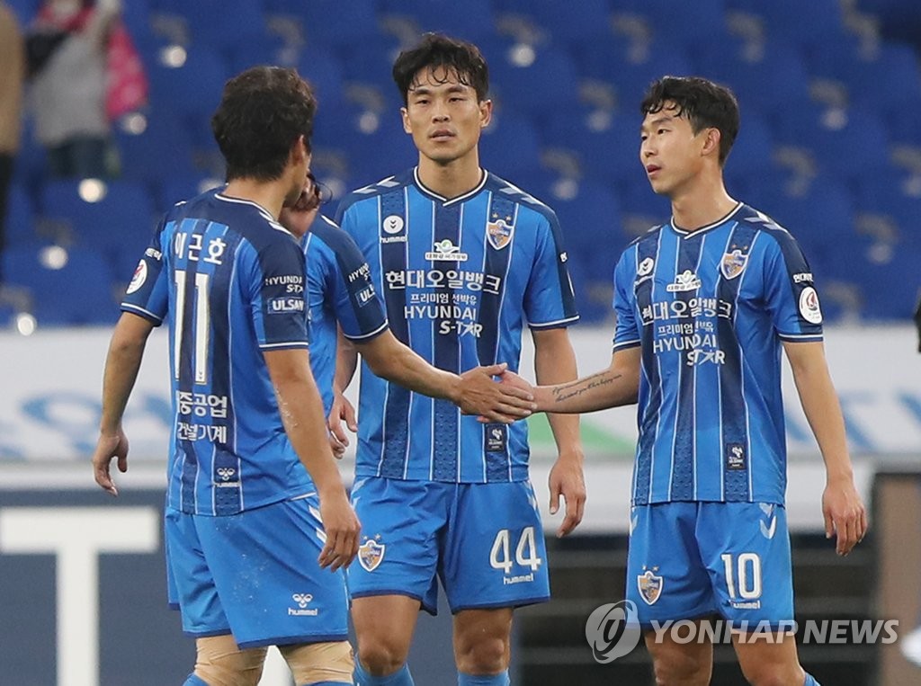 Ulsan Hyundai FC players react to their 3-0 victory over Gwangju FC to clinch second place in the K League 1 at Ulsan Munsu Football Stadium in Ulsan, 415 kilometers southeast of Seoul, on Nov. 1, 2020. (Yonhap)