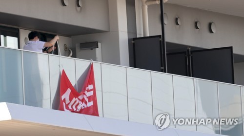 [올림픽] 철거되는 이순신 정신 글귀 현수막