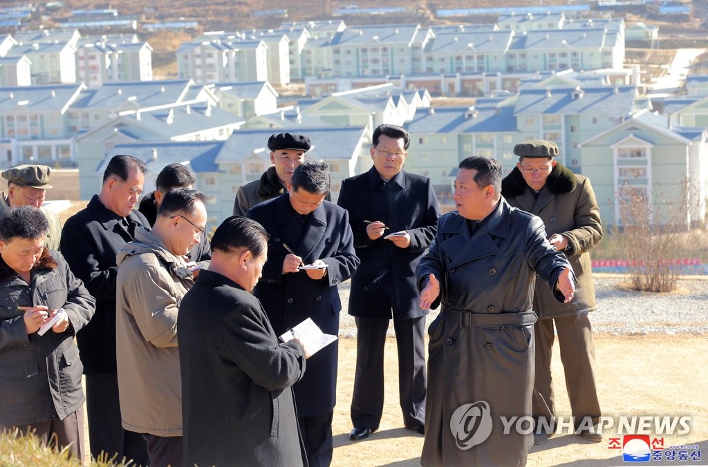 In this file photo released by North Korea's official Korean Central News Agency on Nov. 16, 2021, the North's leader Kim Jong-un (R, front) talks with officials as he visits the city of Samjiyon, at the foot of Mount Paekdu in northern North Korea. (For Use Only in the Republic of Korea. No Redistribution) (Yonhap) 