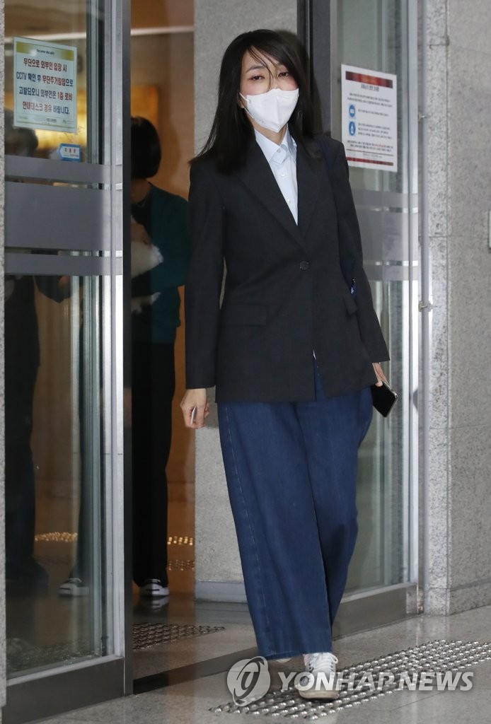 Kim Keon-hee, wife of the main opposition People Power Party's presidential candidate, Yoon Suk-yeol, leaves her residence in Seoul on Dec. 15, 2021, to head to her office. (Yonhap)