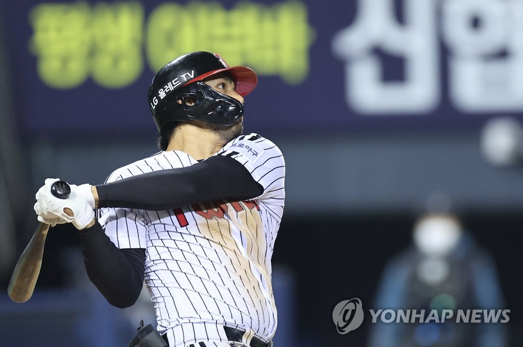 In this file photo from April 8, 2022, Rio Ruiz of the LG Twins hits a triple against the NC Dinos during the bottom of the eighth inning of a Korea Baseball Organization regular season game at Jamsil Baseball Stadium in Seoul. (Yonhap)