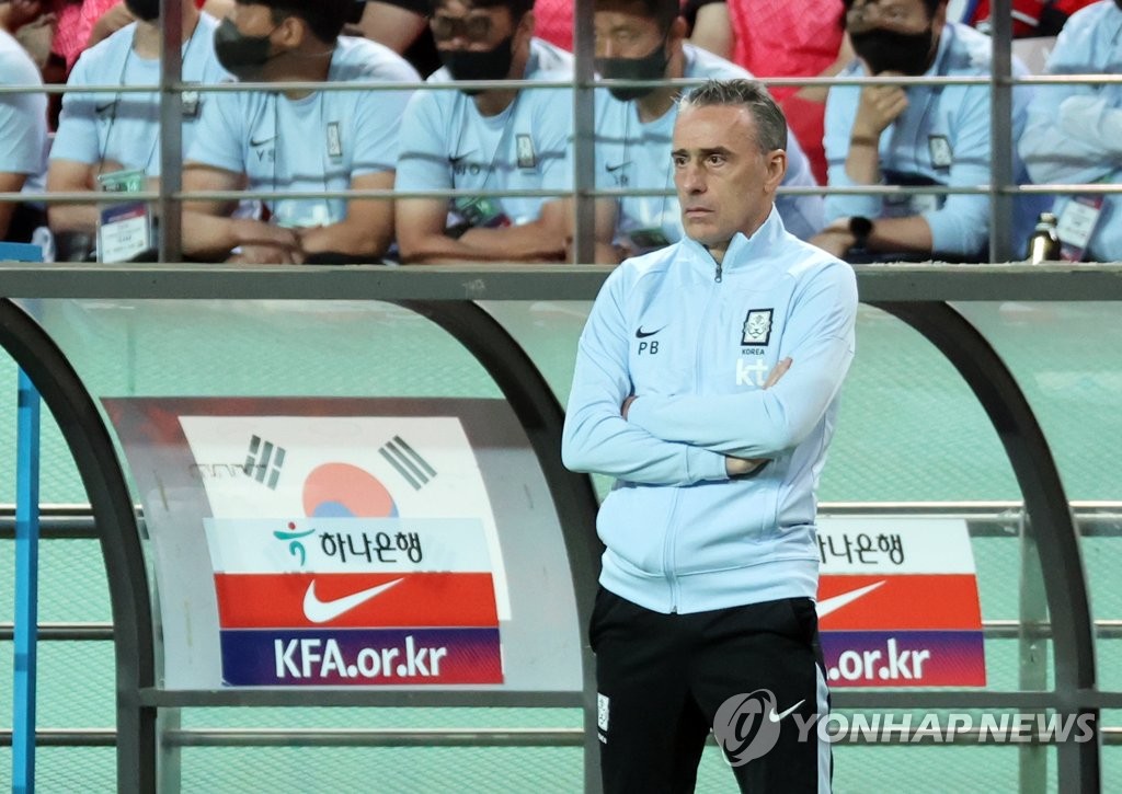 South Korea head coach Paulo Bento watches his team in action against Egypt during a friendly football match at Seoul World Cup Stadium in Seoul on June 14, 2022. (Yonhap)