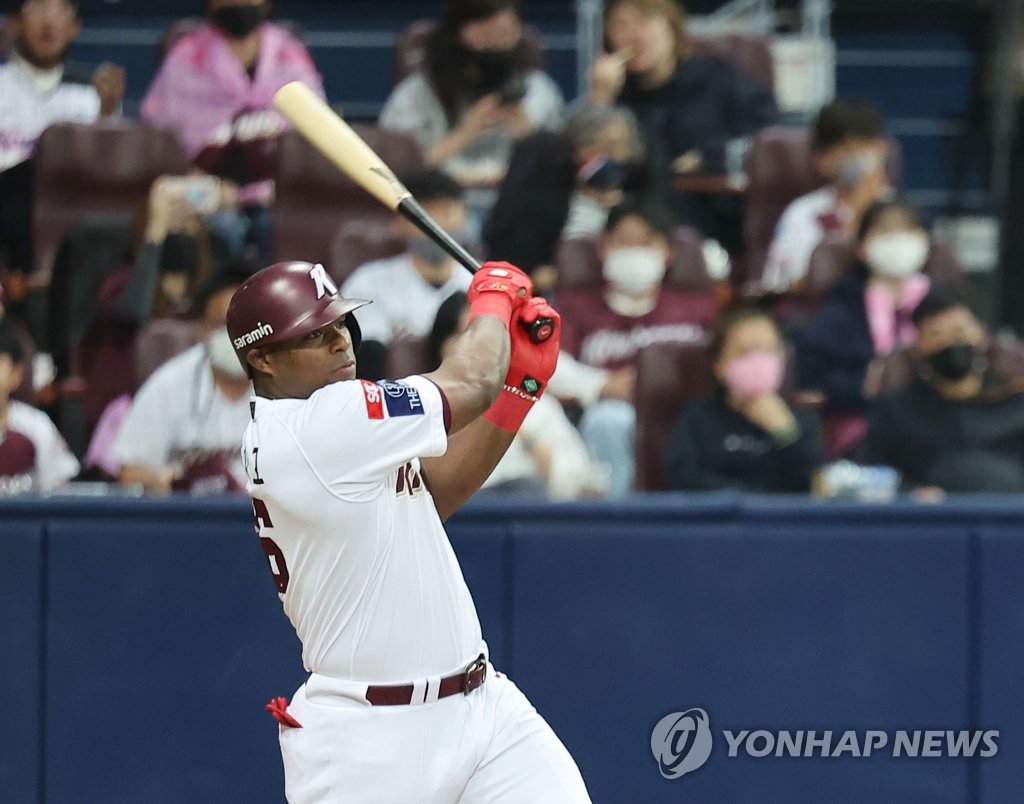 Yasiel Puig of the Kiwoom Heroes hits an RBI single against the KT Wiz during the bottom of the third inning of Game 1 of the first round in the Korea Baseball Organization postseason at Gocheok Sky Dome in Seoul on Oct. 16, 2022. (Yonhap)