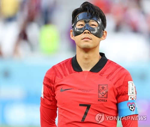 South Korean captain Son Heung-min waits for the start of the team's Group H match against Uruguay at the FIFA World Cup at Education City Stadium in Al Rayyan, west of Doha, on Nov. 24, 2022. (Yonhap)