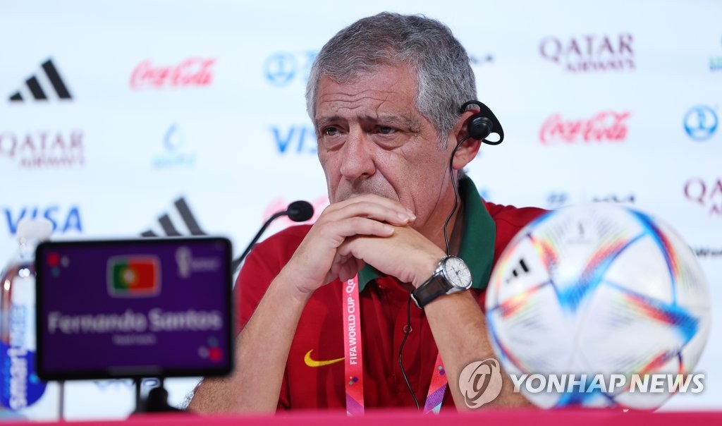 Portugal head coach Fernando Santos listens to a question at a press conference ahead of his team's Group H match against South Korea at the FIFA World Cup at the Main Media Centre in Al Rayyan, west of Doha, on Dec. 1, 2022. (Yonhap)