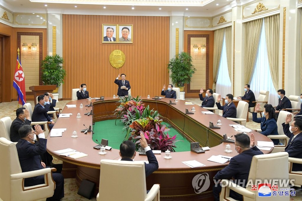 This photo, carried by North Korea's official Korean Central News Agency on Dec. 7, 2022, shows members of the standing committee of the Supreme People's Assembly (SPA) convening a plenary meeting in Pyongyang the previous day. The committee decided to hold a SPA session on Jan. 17. [For Use Only in the Republic of Korea. No Redistribution] (Yonhap)