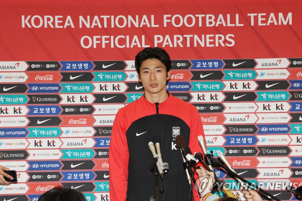 South Korean forward Cho Gue-sung speaks to reporters at Incheon International Airport, west of Seoul, after returning home from the FIFA World Cup in Qatar on Dec. 7, 2022. (Yonhap)