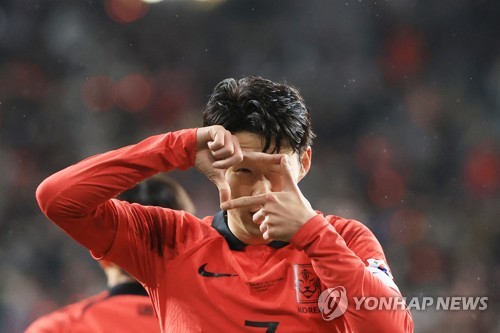 Son Heung-min of South Korea celebrates his first goal against Colombia during the teams' friendly football match at Munsu Football Stadium in Ulsan, 305 kilometers southeast of Seoul, on March 24, 2023. (Yonhap)