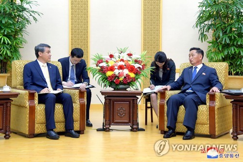 North Korean Premier Kim Tok-hun (R) meets with China's new ambassador in Pyongyang, Wang Yajun, on May 17, 2023, in this photo released by the North's official Korean Central News Agency. (For Use Only in the Republic of Korea. No Redistribution) (Yonhap)