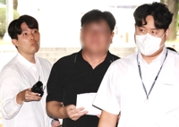 '1천억대 경남은행 횡령' 공범 증권사 직원 구속