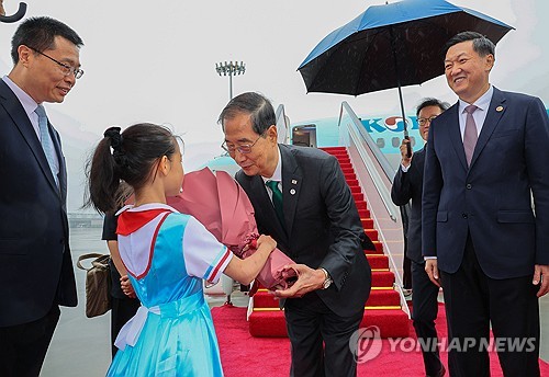 PM arrives in Hangzhou