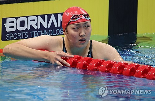 Swimming: N. Korean swimmer competes in 100m freestyle